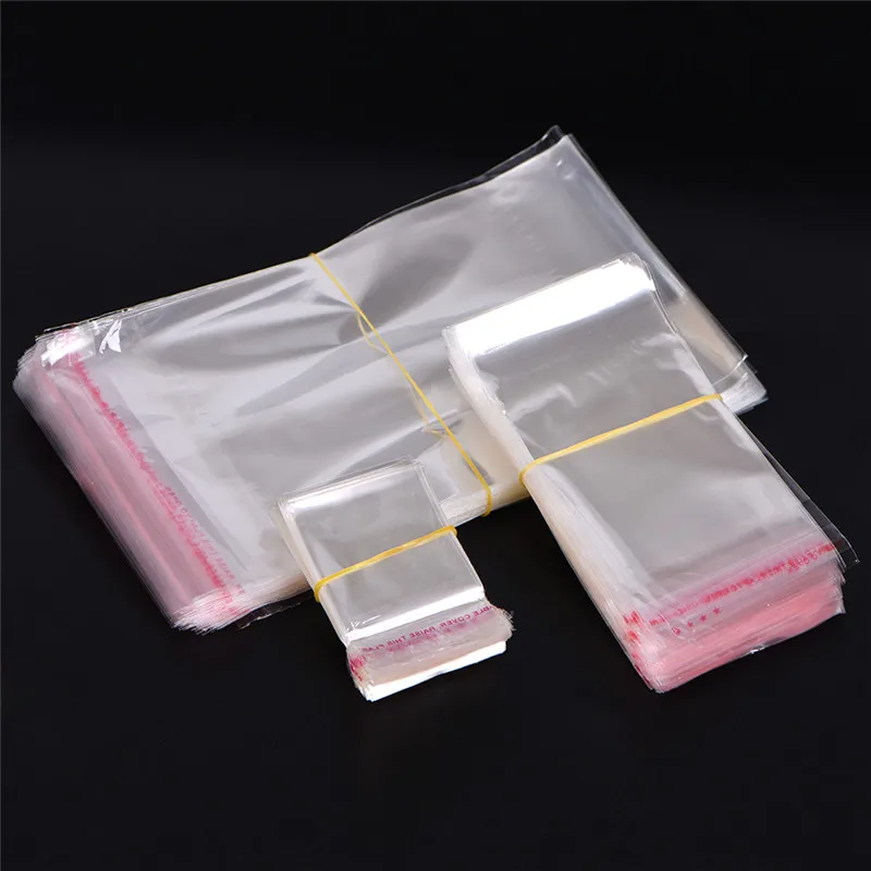 200 бр Doreen Box Самозалепващи се Найлонови Торбички с Печата Прозрачна Опаковка За Съхранение на бижута от мъниста 7x6 см. (Използваема площ: 6x5 см) 3